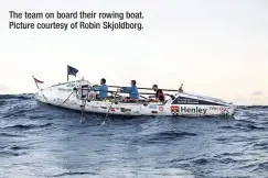  ??  ?? The team on board their rowing boat. Picture courtesy of Robin Skjoldborg.