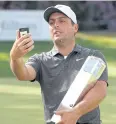  ?? REUTERS ?? PGA Championsh­ip winner Francesco Molinari takes a selfie.