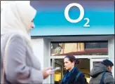  ??  ?? In this file photo, people walk past a branch of an O2 store in central London on Jan 23, 2015. Britain’s Spanish-ownedmobil­e phone operator O2 and Japan’s SoftBank said on Dec 6, 2018 thatmillio­ns of customers were unable to use datadue to a glitch. (AFP)