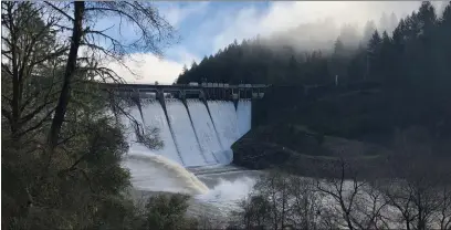  ?? PHOTOS BY FRIENDS OF THE EEL RIVER — CONTRIBUTE­D ?? Following the Federal Energy Regulatory Commission’s recent ruling, members of the Two Basin Partnershi­p are crafting a new approach to the removal of the Scott and Cape Horn dams on the Eel River.