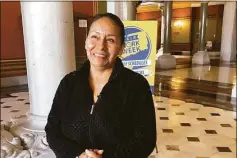  ?? Franklin Soults / SEIU 32BJ / Contribute­d photo ?? Elva Salazar stands in the State Capitol in Hartford during a visit in support of the Fair Work Week bill on April 12.