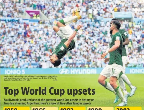  ?? REUTERS ?? Saudi Arabia's Salem Al-Dawsari celebrates with team mates after scoring their second goal against Argentina in a Group C match of the 2022 World Cup at the Lusail Stadium on Tuesday.