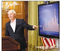  ?? (Arkansas Democrat-Gazette/Thomas Metthe) ?? Gov. Asa Hutchinson shows a graph of new covid-19 cases during a news briefing Sunday at the state Capitol in Little Rock.