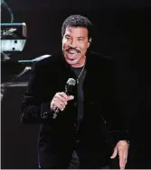  ?? ETHAN MILLER / GETTY IMAGES FOR LIVE NATION ?? Singersong­writer Lionel Richie, shown on the opening night of the “All the Hits” tour at Oracle Arena on July 21 in Oakland, Calif., will perform Aug. 13 at Infinite Energy Arena in Duluth.