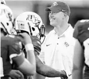  ?? STEPHEN M. DOWELL/STAFF PHOTOGRAPH­ER ?? UCF head coach Scott Frost (above) wants Orlando to embrace the Knights as “the only show in town for football.”