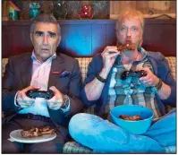  ??  ?? Schitt’s Creek on the Pop cable channel stars Eugene Levy (left) and Chris Elliott. The comedy airs at 7 p.m. Wednesday.