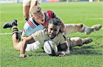  ??  ?? A match for the ages: James Chisholm goes over for the winning score (left); Wasps’ Kyle Eastmond scores a try (above); James Haskell (right) checks on Quins’ centre Jamie Roberts after a late tackle for which the Wasps flanker was sent off and (top)...