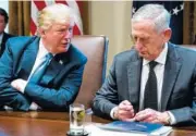  ?? FILE PHOTO BY DOUG MILLS/THE NEW YORK TIMES ?? President Donald Trump speaks to Defense Secretary Jim Mattis during a recent Cabinet meeting. Officials say the president has soured on his defense secretary, and that Mattis is increasing­ly weary of capricious demands from his boss.