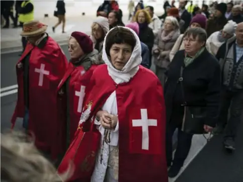  ?? © ?? Een religieus geïnspiree­rde betoging tegen lgbti-rechten in Polen.
Attila Husejnow/getty images