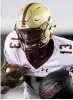  ??  ?? BROWN: QB solid in debut in Boston College victory.