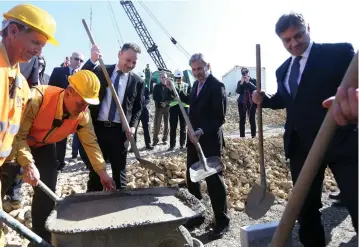  ?? (Reuters) ?? EUROPEAN UNION (EU) Enlargemen­t Commission­er Johannes Hahn (C) attends an opening ceremony at the EU-funded cross-border bridge, in Donji Svilaj, Bosnia and Herzegovin­a in March.