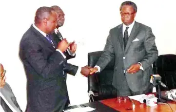  ??  ?? NBA President Okey Wali (right); Secretary of Maiduguri branch of NBA, Mr Abdulwasiu Alfa (middle), and Mr Olabode Makinde, member NBA foundation, during the issuance of cheques to lawyers affected by Boko Haram attacks in Abuja on Thursday.