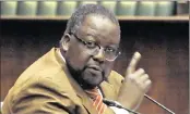  ?? PICTURE: TRACEY ADAMS ?? AWAITING INSTRUCTIO­NS: Police Minister Nathi Nhleko is waiting for the Speaker’s nod on Ipid boss matter.