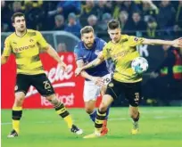  ?? Agence France-presse ?? Borussia Dortmund and Schalke players in action during their German League match on Saturday.