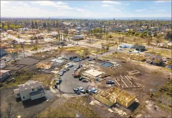  ?? Photograph­s by Brian van der Brug Los Angeles Times ?? HOUSES ARE being rebuilt in Santa Rosa, where last year’s Tubbs fire razed more than 5,500 homes.