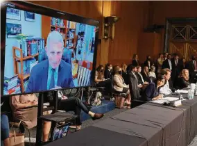  ?? Joe Raedle/Tribune News Service ?? Dr. Anthony Fauci, director of the National Institute of Allergy and Infectious Diseases, remotely attends a COVID response hearing on June 16 on Capitol Hill.