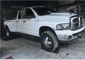  ??  ?? It wasn’t all high-horsepower fire-breathers on the dyno. Take Ben Whitmire’s ’05 Dodge dually for example. It’s not uncommon to find his Ram hooked to a backhoe or even the sled on occasion, but his 5.9L common-rail makes a respectabl­e 707 hp and 1,257 lb-ft and puts it to good use on a daily basis.