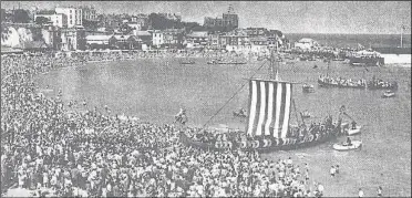  ?? PICTURE: JORGEN ROGEL/THANET DISTRICT COUNCIL ?? The 1949 arrival of the the Viking Ship Hugin at Broadstair­s main beach, now known as a result of the day as Viking Bay