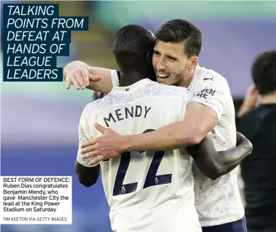  ?? TIM KEETON VIA GETTY IMAGES ?? BEST FORM OF DEFENCE: Ruben Dias congratula­tes Benjamin Mendy, who gave Manchester City the lead at the King Power Stadium on Saturday