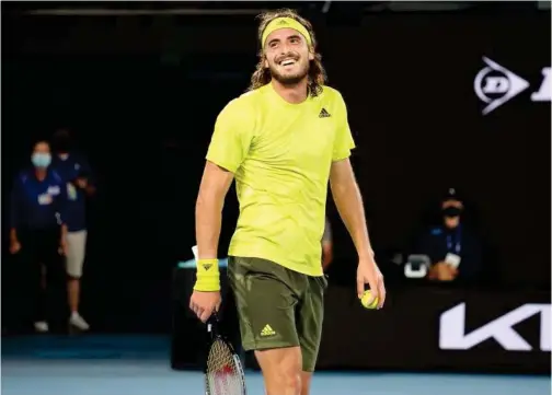  ?? Reuters ?? ↑ Stefanos Tsitsipas celebrates after winning his Australian Open quarter-final match against Rafael Nadal (unseen) in Melbourne on Wednesday.