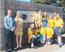  ??  ?? Mr Capra (principal), Erin Woods (year 10 student/event co-ordinator) and the Palm Beach Currumbin High School student council get ready for Daffodil Day.