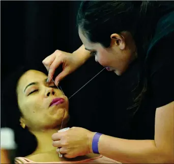  ??  ?? THREADING IS ONE OF THE SERVICES provided in the Spa Area at the Women’s Expo.