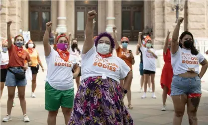  ?? Photograph: Jay Janner/AP ?? Protesters campaign against the six-week abortion ban at the Capitol in Austin, Texas.