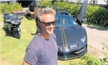  ?? Photo / Alison Smith ?? Stu Goldsworth­y at home in Whangamata¯ with some of his vehicles.