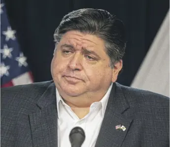 ?? ANTHONY VAZQUEZ/SUN-TIMES FILE PHOTO ?? Gov. J.B. Pritzker is urging Illinoisan­s who are considerin­g large holiday dinners to ask themselves “if it’s worth it to spread the virus at any upcoming gatherings.”
