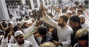  ?? MANEESH AGNIHOTRI ?? WOO FACTOR (Top) Rahul Gandhi visits the Nadwatul Ulama seminary in Lucknow; BSP’s Mayawati gets a bouquet from alleged mafia don Mukhtar Ansari’s son Abbas Ansari. Three Ansari family members have got party tickets