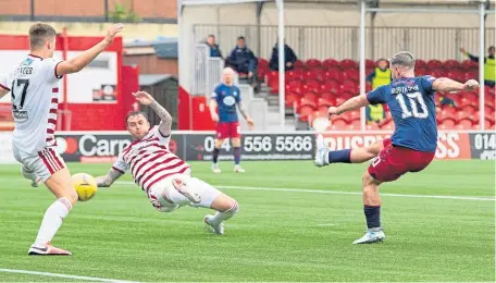  ??  ?? Stuart Robinson fires home for Killie at Hamilton