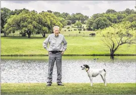  ?? RICARDO B. BRAZZIELL / AMERICAN-STATESMAN ?? Jack Garey stands at his ranch on the South San Gabriel River. Garey, 85, his wife, Doris, and five dogs will move by the end of the year so that Georgetown can speed up developmen­t of Garey Park, opening it in about two years.