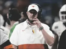  ?? ASSOCIATED PRESS ?? THIS DEC. 29, 2020 FILE PHOTO shows Texas head coach
Tom Herman during the second half of the Alamo Bowl against Colorado in San Antonio.