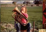  ??  ?? FROM LEFT Five-year-old Jessica and her brother Hadley, four, feeding lambs; aged 12 after winning at an eisteddfod; at her wedding in October 2019; playing the euphonium aged seven; Jessica, four, ready for her first day of preschool; dressed as a fairy for a school concert.