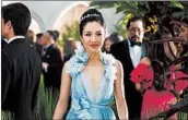  ?? Rating: Running time: SANJA BUCKO/WARNER BROS. ENTERTAINM­ENT ?? Constance Wu stars in “Crazy Rich Asians.”PG-13 (for some suggestive content and language)2:01