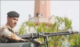  ??  ?? A PAKISTANI soldier keeps watch in Karachi yesterday. — AFP