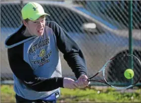  ?? PETE BANNAN — DIGITAL FIRST MEDIA ?? Kennett’s Trent Harner returns a serve from Coatesvill­e’s Ryan Stellato Wednesday at Coatesvill­e.