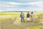  ?? APERTURE ?? “Molly Alexie and her children after a harvest of beach greens in Quinhagak, Alaska,” 2018, by Nalikutaar Jacqueline Cleveland, from her series “Ethnobotan­y.” Part of “Native America: In Translatio­n.”