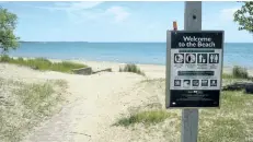  ?? DAVE JOHNSON/WELLAND TRIBUNE ?? Humberston­e Centennial Park Beach was open for swimming on Friday.