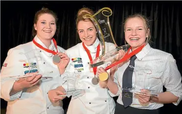  ??  ?? From left: Nerys Whelan, Genevieve Lysaght and Abbey Warner, winners in the prestigiou­s annual Nestle Toque d’Or student culinary competitio­n.