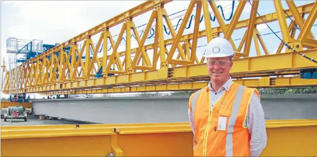  ?? Photo: KARINA ABADIA ?? Altruistic approach: Integratio­n and relationsh­ips director for the Well-Connected Alliance Andrew Rose says the yellow gantry at Waterview symbolises the importance of looking after workers’ wellbeing.