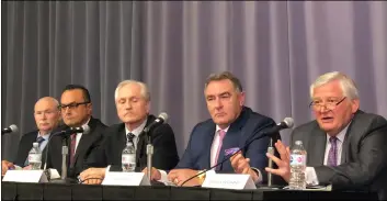  ??  ?? Brian Greenspan (far right) the lawyer for the family of billionair­e Barry Sherman and his wife Honey, speaks at a news conference in Toronto on Friday. AP PhOtO/RObeRt GIllIeS