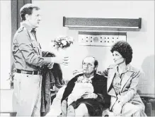  ??  ?? Emily (Suzanne Pheshette) and Howard Borden (Bill Daily) try to cheer up Bob Hartley (Bob Newhart), middle, in hospital Christmas Eve.