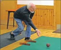  ?? 50_c44bowls02 ?? Ken Bryce rolls into action in Tayinloan village hall.