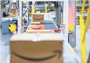  ?? NATHAN PAPES/SPRINGFIEL­D NEWS-LEADER ?? The job cuts Amazon announced Monday will hit profitable areas for the company including its cloud computing unit AWS and its burgeoning advertisin­g business.