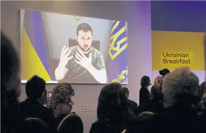  ?? AFP ?? Ukrainian President Volodymyr Zelensky delivers a statement by video link on the sidelines of the World Economic Forum (WEF) annual meeting in Davos on Wednesday.