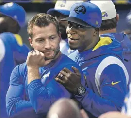  ?? Wally Skalij Los Angeles Times ?? RAHEEM MORRIS right, says of the challenges facing Sean McVay: “It’s a great opportunit­y ... to get that coach-speak out and to go act on those things.”