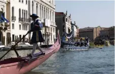  ?? Clara Vannucci, © The New York Times Co. ?? The Regata Storica, which celebrates Venetian rowing with historical costumes and rowing races, in Venice on Sept. 1.