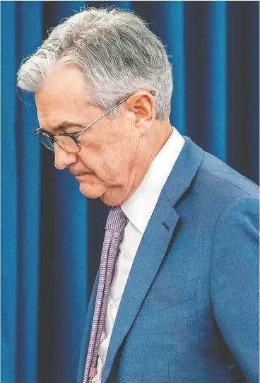  ?? ERIC BAR AD AT/ AFP VIA GETTY IMAGES ?? U. S. Federal Reserve chair Jerome Powell gives a press briefing Tuesday after announcing the Fed will cut interest rates by a half point to a range of 1.0-1.25 per cent.