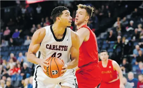  ?? U SPORTS ?? Carleton forward Eddie Ekiyor, a second-team all-Canadian, scored 25 points in the Ravens’ quarter-final victory over Acadia on Thursday night at the U Sports Final 8 tournament in Halifax. Carleton, seeking its eighth consecutiv­e title, plays the...